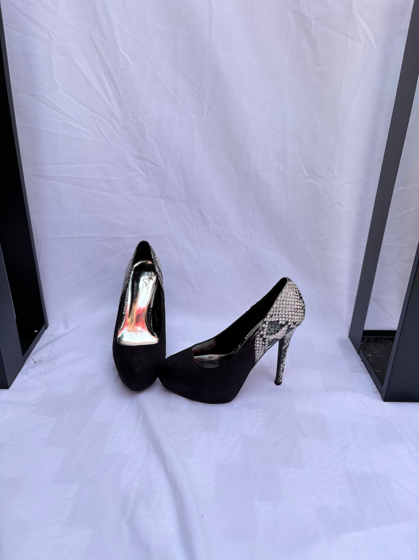 Khloe Kardashian, size 7.5, snake skin/black heels, good condition